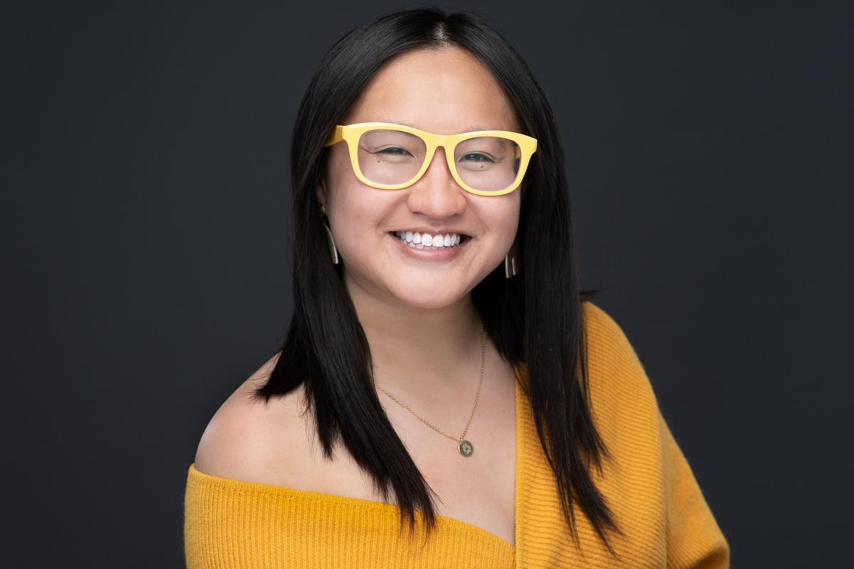Women's Edmonton LinkedIn Profile Photo on dark grey